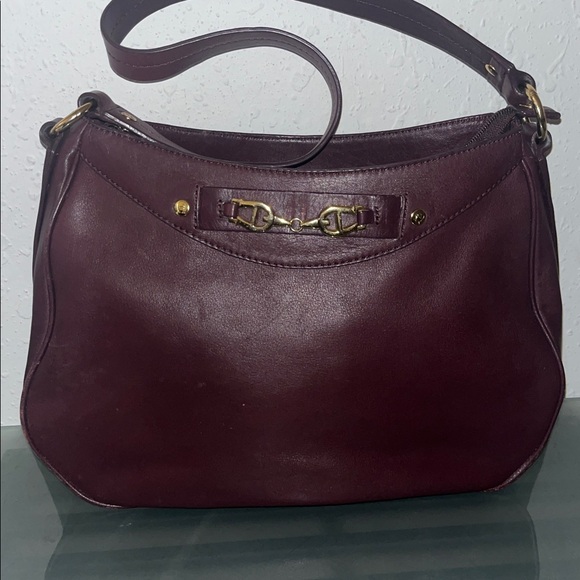 vintage Etienne Aigner leather shoulder bag with a brass horse bit detail. - Picture 11 of 14